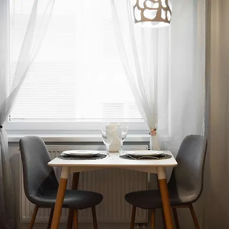 Stylish Designer With Free Street Parking *